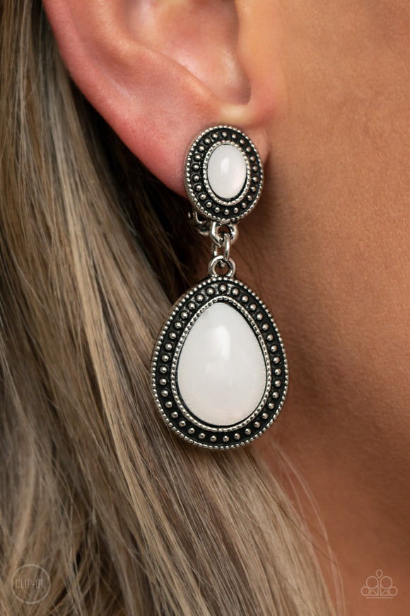 Carefree Clairvoyance - White Clip-On Earrings - Paparazzi Accessories
