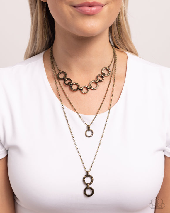 Dotted Demeanor - Brass Necklace - Paparazzi Accessories