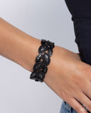 Riding the Clutch - Black Bracelet - Paparazzi Accessories