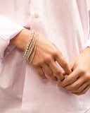 Persistent Pizzazz - Gold Bracelet - Paparazzi Accessories