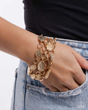 Hammered Helm - Gold Bracelet - Paparazzi Accessories Bracelet Bedazzle Me Pretty Mobile Fashion Boutique