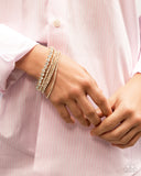 Persistent Pizzazz - Gold Bracelet - Paparazzi Accessories Bracelet Bedazzle Me Pretty Mobile Fashion Boutique