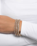 Persistent Pizzazz - Gold Bracelet - Paparazzi Accessories Bracelet Bedazzle Me Pretty Mobile Fashion Boutique