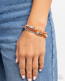 Stellar Salvage - Orange Bracelet - Paparazzi Accessories Bracelet Bedazzle Me Pretty Mobile Fashion Boutique