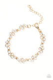 still-glowing-strong-gold-bracelet-paparazzi-accessories