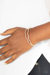 Delicate Dazzle - Gold Bracelet - Paparazzi Accessories