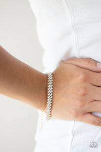 Chicly Candescent - Gold Bracelet - Paparazzi Accessories