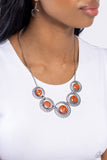 Elliptical Effervescence - Orange Necklace - Paparazzi Accessories
