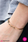Bite The Bullet - Gold Bracelet - Paparazzi Accessories Bracelet Bedazzle Me Pretty Mobile Fashion Boutique