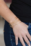 Strike Out Shimmer - Gold Bracelet - Paparazzi Accessories Bracelet Bedazzle Me Pretty Mobile Fashion Boutique